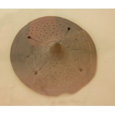 Clay figure, two rounded swastikas and a solar cross